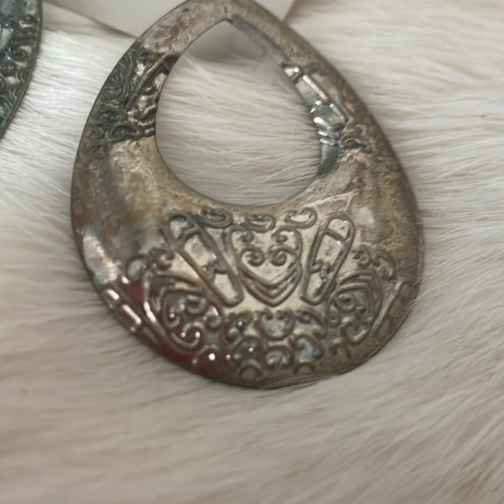 Silver Tone Oval Shaped Textured Pierced Earrings